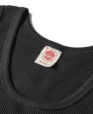 Black ribbed cotton tank top neckline with inner neck label