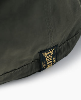 Olive nylon cap side logo patch with stitched brim edge
