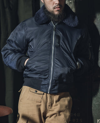 Navy B-15C flight jacket on model with shearling-style collar and front zipper