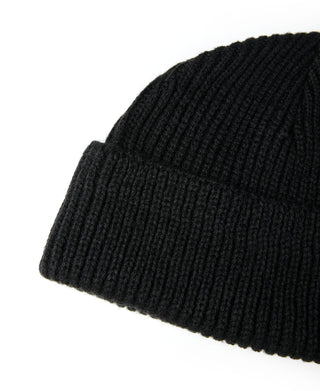 Black ribbed knit watch cap with folded cuff