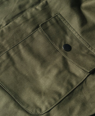 Olive deck jacket chest pocket with flap and round button