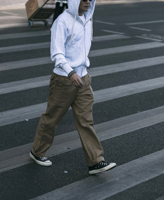 Khaki utility bermuda pants with straight legs and cuffed hem