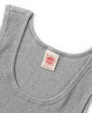 Close-up of gray cotton tank top neckline with size label