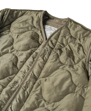 Olive quilted field jacket liner front close-up with zip fly and button snaps