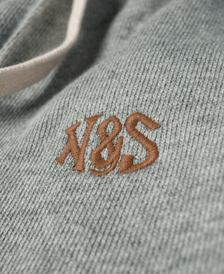 N&S logo embroidery on gray cotton-terry sweatpants fabric