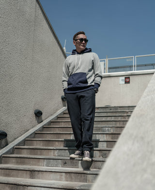 Black terry sweatpants with drawstring waistband and relaxed straight leg