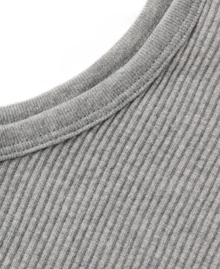 Close-up of gray ribbed cotton tank top shoulder seam and neckline