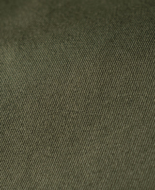 Olive textured jacket fabric close-up