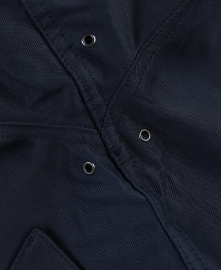 Navy deck hook jacket front with grommet-style eye buttons