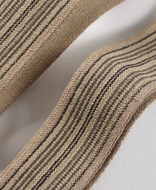 Khaki striped woven suspender straps with dark vertical stripe pattern