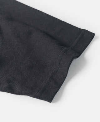Black raglan sleeve hem on white quarter-zip t-shirt