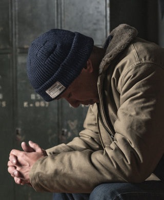 Navy knit watch cap beanie with ribbed crown and folded cuff
