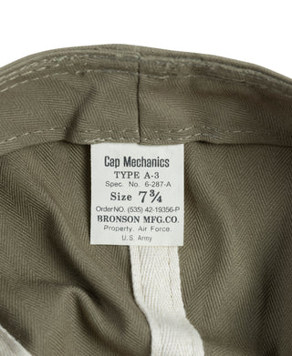 Olive A-3 flight cap with interior label showing Type A-3 and size 7 3/4