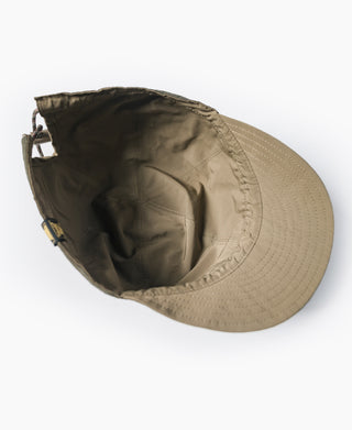 Reversible cap underside in khaki with curved brim and vent stitching