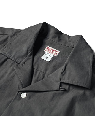 Dark gray shirt interior with size label and button placket